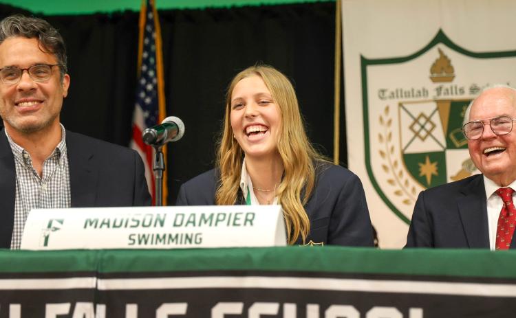 Wade Cheek/The Clayton Tribune. Madison Dampier has signed with the University of Cincinnati to swim for the Bearcats.