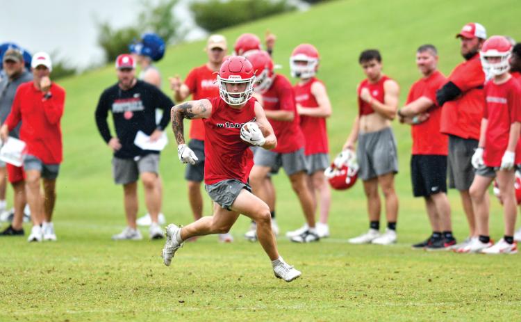 Wade Cheek/The Clayton Tribune. Rabun County senior running back Noah English finds space against Greene County at Athens Academy on Wednesday, June 4.