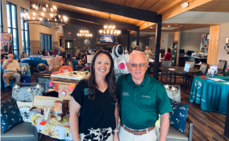 Submitted photo. AARN VP Megan Eyrich (left) and President Ron Oglethorpe attend the Appalachian Aging Resource Network (AARN) Senior Support Summit July 14-15 at Hiawassee Park in Towns County.