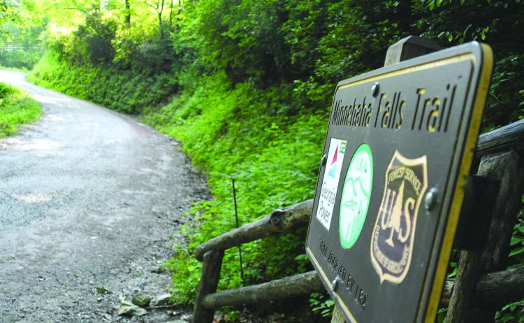 Enoch Autry/The Clayton Tribune. An arrest has been made after a man in a pickup reportedly pointed a crossbow at a female on Bear Gap Road near the Minnehaha Falls Trail.