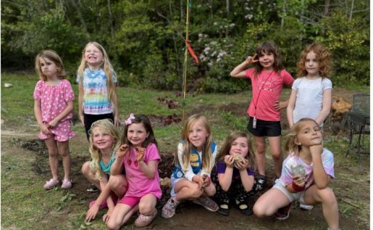 Submitted photo. Daisies of Girl Scouts Troop 10186 are engaged in planting as part of Arbor Day 2025 with Keep Rabun Beautiful.