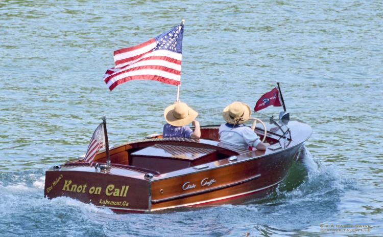 Photo courtesy K.A. Hamdy-Swink. This 1950 Chris Craft Runabout ‘17 is “Knot on Call” while participating in Lake Rabun’s annual Wooden Boat Parade on July 6. It is owned by Dr. Helen McSwain.