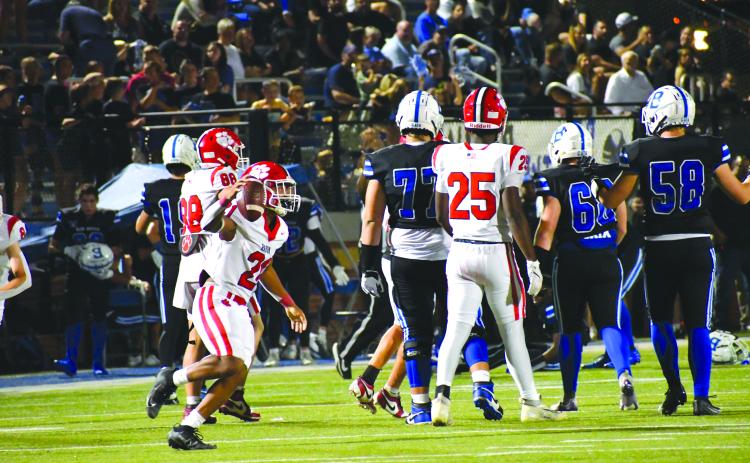 Wesley Branch/The Clayton Tribune. Rabun County senior defensive back Shaun Fruster (left) celebrates after intercepting Bremen quarterback Eli Brock in Rabun County’s 14-3 win on Sept. 12. The 4-0 Wildcats face Banks County Friday.