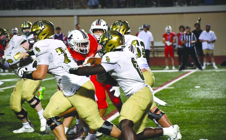 Wesley Branch/The Clayton Tribune. Rabun Gap sophomore running back Royce Djouguem navigates through Providence Day’s defense during the Eagles’ game versus the Chargers on Sept. 19. Djouguem scored his first touchdown of the season in the 55-34 loss.