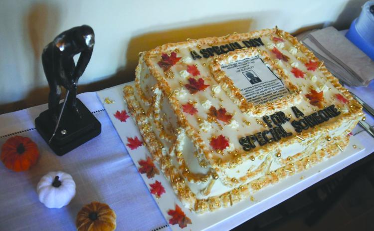 Enoch Autry/The Clayton Tribune. A cake with a copy of the dedication information for Jim Bleckley was created for the Oct. 24 ceremony at the county’s welcome center.