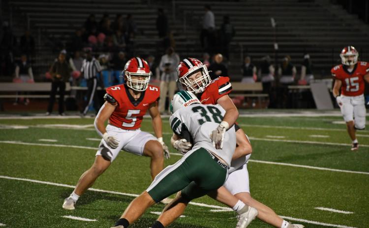 Wesley Branch/The Clayton Tribune. Rabun County defensive lineman Mack Williams tackles Tucker Rhodes in the Wildcats’ game against the Spartans. Williams finished the game with three total tackles and a sack.