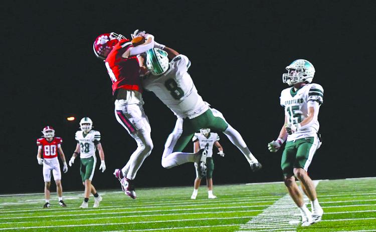 Enoch Autry/The Clayton Tribune. Rabun County sophomore wide receiver Colter Cannon hauls in a heavily contested 50-50 catch against Athens Academy on Friday, Oct. 24. Cannon’s only catch of the night, pictured above, went for 32 yards.