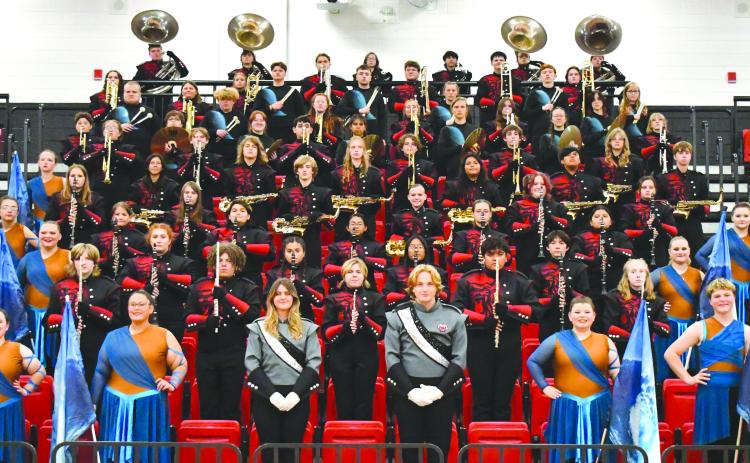 Submitted Photo. The RCHS marching band poses for a photo at the beginning of the school year. The Wildcats claimed straight superior rankings at the Berkmar Marching Invitational on Oct. 18 in Lilburn, Ga. While the marching competition season is complete, the band will play a Veterans Day concert of patriotic music with the RCHS chorus on Nov. 13. Then the band will share the stage with the middle school and elementary school bands at their Christmas concert on Dec. 9. Both concerts will be in the high sc