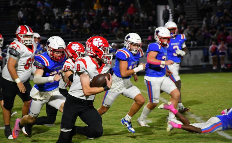 Wesley Branch/The Clayton Tribune. Wildcat sophomore Colter Cannon runs after a screen pass from Ty Truelove for a big gain versus the Patriots of Oglethorpe County on Oct. 10. Cannon totaled 68 receiving yards and a touchdown in the 28-19 loss.