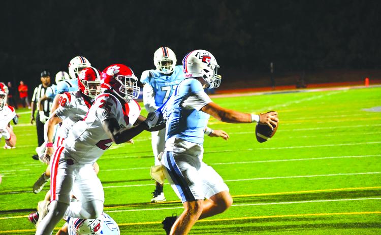 Wesley Branch/The Clayton Tribune. Rabun County defensive lineman Takeo Hibler brings down Providence Christian Academy quarterback Riley Braiden for Hibler’s first sack of the season in the Wildcats’ 62-21 win over the Storm.