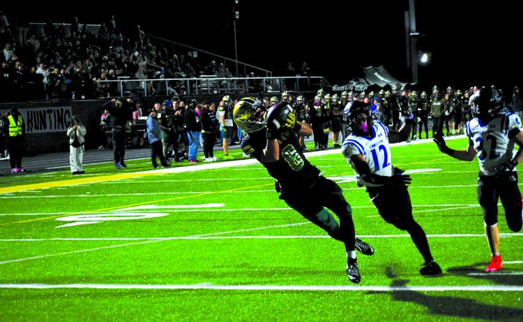 Enoch Autry/The Clayton Tribune. Rabun Gap senior Isaac Obrokta, a Georgia Tech commit, pulls in a 39-yard touchdown reception from quarterback Gavin Owens in the Eagles’ 55-48 semifinal loss to Charlotte Christian on Nov. 14.