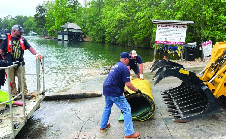 Submitted photo. The LBCA holds an annual Cleanup Day every year in May. The organization works with Georgia Power Company and citizen volunteers for a lake-wide cleanup to help remove debris from Lake Burton.