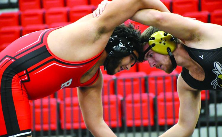 Wesley Branch/The Clayton Tribune. Rabun County sophomore Joseph Gonzalez battles with a Hayesville (N.C.) wrestler in his first match of the night on Dec. 10.