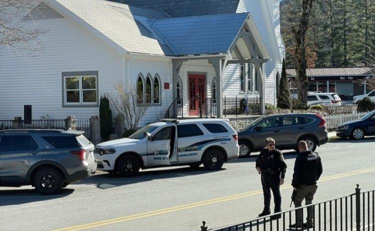 Josh Bryson/The Highlander. The Highlands Police Department, Macon County Sheriff’s Department and Highlands Fire and Rescue respond to the swatting incident at the Church of the Incarnation on Dec. 11.