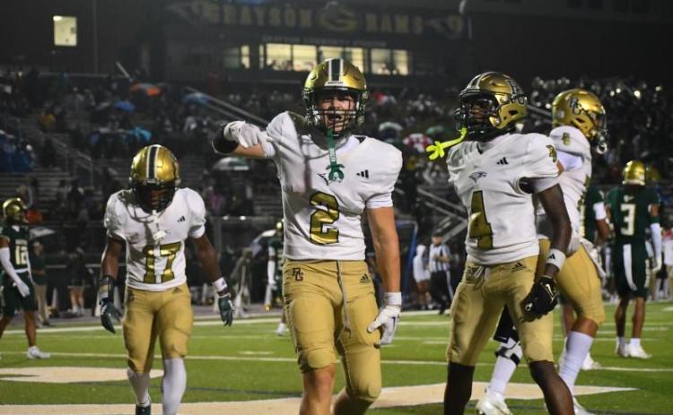 Wesley Branch/The Clayton Tribune. Rabun Gap-Nacoochee School senior wide receiver and Wake Forest signee Walker Bryson celebrates after a touchdown catch in Rabun Gap’s game against Grayson on Aug. 22. Bryson signed with the Demon Deacons of the Atlantic Coast Conference on Dec. 3, just days after being told Indiana, where he previously committed, was “moving on.”