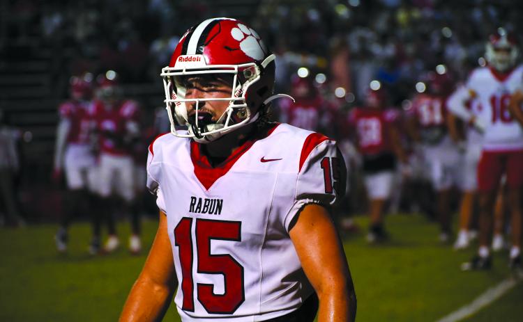 Wesley Branch/The Clayton Tribune. Rabun County senior Reid Giles looks to the sideline in Rabun County’s 49-42 win over Dalton on Sept. 5. Giles was named Georgia High School Football Daily Player of the Week for his performance versus Dalton and was named All-State this season.