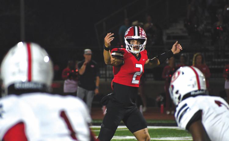 Wesley Branch/The Clayton Tribune. Rabun County senior quarterback Ty Truelove, an Erskine College commit, signals to his teammates before a play in Rabun County’s 35-0 win over Berrien in the second round of the GHSA state playoffs on Nov. 21, 2025. Truelove led the Wildcats to two state quarterfinal appearances in three years as a starter.
