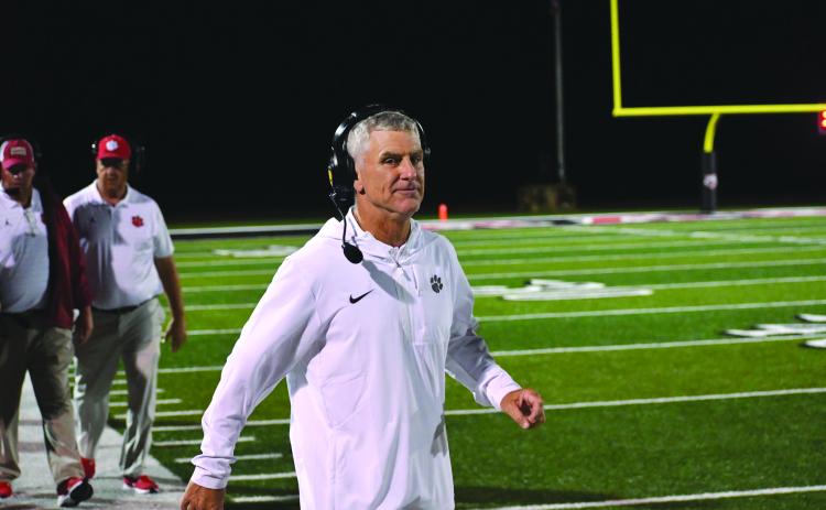 Wesley Branch/The Clayton Tribune. Rabun County defensive coordinator Bill Stewart eyes the camera during Rabun County’s season-opening 42-6 win over White County on Aug. 15, 2025. Stewart was reportedly in consideration for the Rome head coaching job, which was expected to be voted upon on Jan. 20 at a Rome City Schools Board of Education meeting.