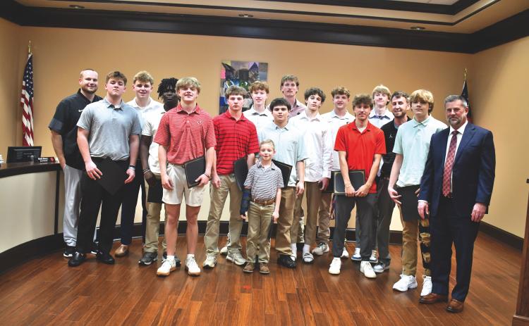 Megan Horn/The Clayton Tribune. The Rabun County High School Boys basketball team was recognized and congratulated for their Class A Division I state championship win during Monday’s Board of Education meeting. The team captured its first state title win with its 52-43 defeat of Southwest in a loud and packed Macon Coliseum on March 13.