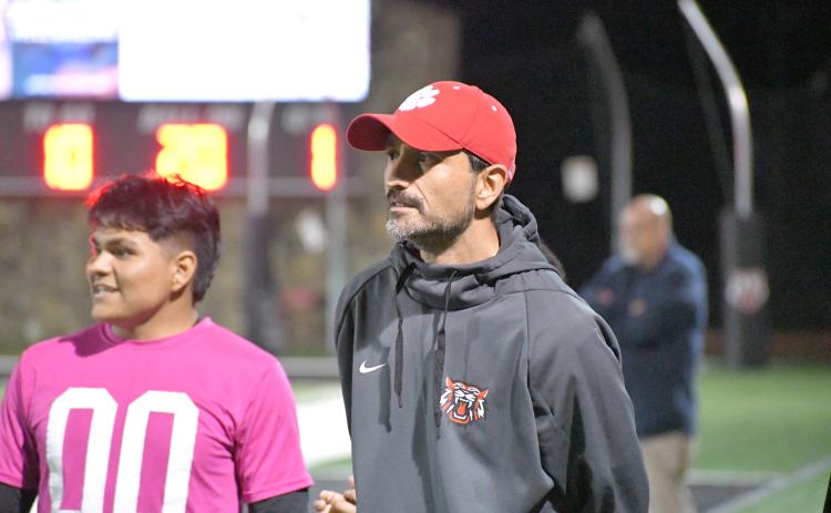 Wesley Branch/The Clayton Tribune. Rabun County head boys soccer coach Cameron Heyen watches his team from the sideline in its 7-3 March 6 win at home over Elbert County. The victory marked Heyen’s first win as the boys head coach.