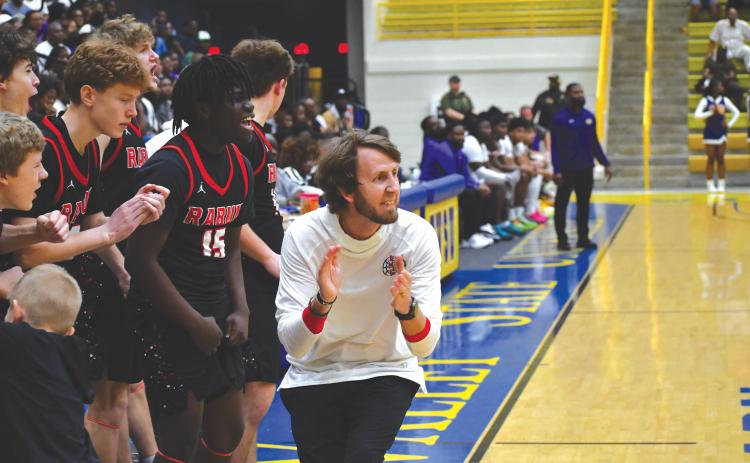 Wesley Branch/The Clayton Tribune. Rabun County head coach David Adcock implores his team from the sideline in the Wildcats’ 70-59 win over Fitzgerald in the Final Four March 7. The Wildcats now face Southwest March 13 for the state title.