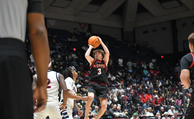 Wesley Branch/The Clayton Tribune. Wildcat senior Huey Blalock, a Navy basketball commit, elevates for his shot against Southwest in the state title game on March 13 in the Macon Coliseum. Blalock was the game’s leading scorer with 29.