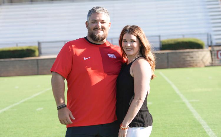 Submitted Photo. Jake Boldin stands with his wife Abby. Boldin has been hired as Rabun County’s new tight ends coach, special teams coordinator and director of football operations for the 2026-2027 school year.
