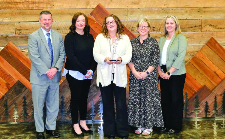 Submitted. Angel McCrackin was honored as the 2026 recipient of the Philip Wright Award for her dedication to improving educational outcomes for students with disabilities. Pictured are Superintendent Steven Cole, left; Renea Jarrard, student services; McCrackin; Meadow Krockum, director of student services; and Kelly McKay, assistant superintendent.