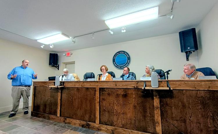 Megan Horn/The Clayton Tribune. Sky Valley City Manager Jason Streetman gives details to council members about $5 million in grant funding available for the proposed sewer project during the March 3 work session.  The next scheduled council meeting is March 17 at the city hall.