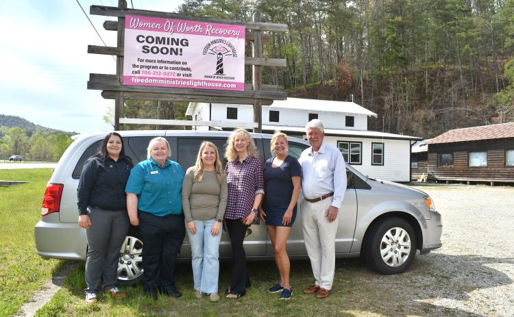 Megan Horn/The Clayton Tribune. Pictured in front of the new van are Jessica Rojas, McDonald’s district supervisor, left; Kim Levitt, McDonald’s general manager; WOW Recovery Director Ashley York; Karen Bacon, Clayton Rotary Foundation chair; Laura Seberg, Rotary Club of Clayton president-elect; and Matt Freeman, Rotary Club of Clayton president.
