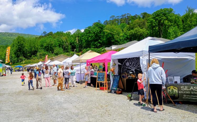 Megan Horn/The Clayton Tribune. Visitors welcome Spring and attend the May 9 Of These Mountains Spring MarketPlace.