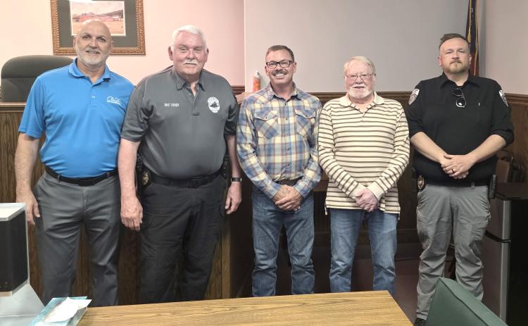 Submitted photo. City of Clayton Mayor Roy Quilliams as well as Council Members Stacy Fountain and Tony Allen along with Lt. Matt Thomas were among city officials present during the swearing-in of Mike Turner as the City of Clayton Police Chief in Probate Judge Savannah Dixon’s courtroom last week.