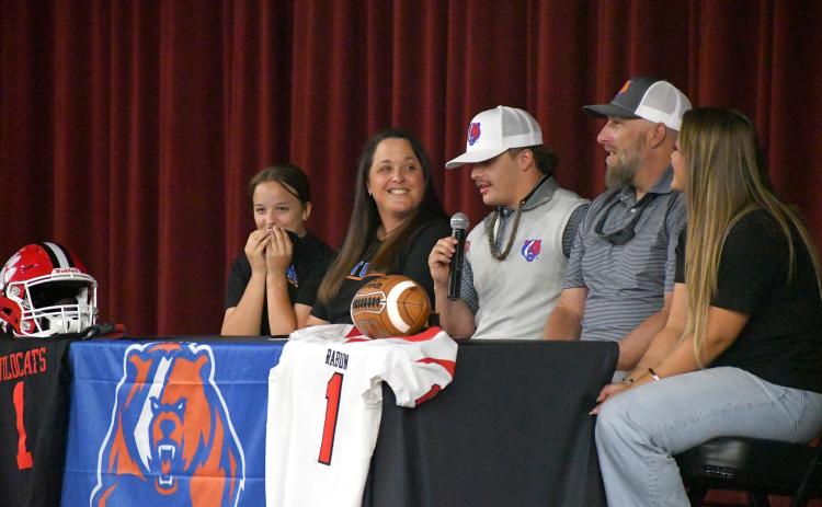 Wesley Branch/The Clayton Tribune. Rabun County senior Lake Evans thanks the many people who helped him in his journey to becoming a collegiate athlete during his signing day ceremony on May 19 at Rabun County High School.