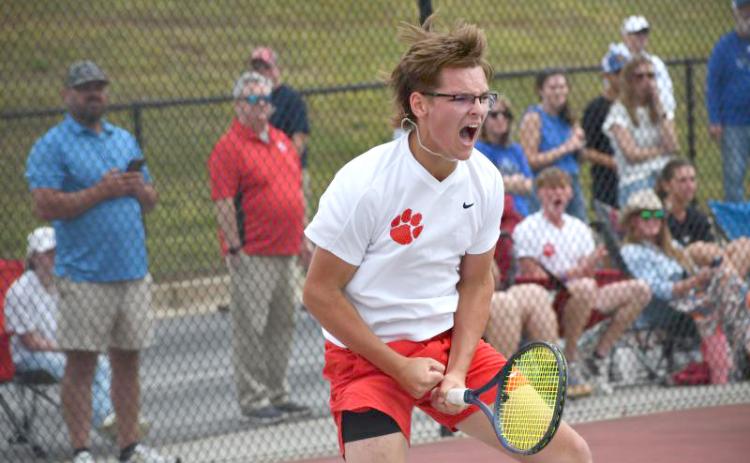 Wesley Branch/The Clayton Tribune. Rabun County junior Lleyton Phillips celebrates after his win on No. 1 singles versus Model on May 8 at Rabun County High School. Phllips and the Wildcats will play for the state championship on Wednesday in Rome.