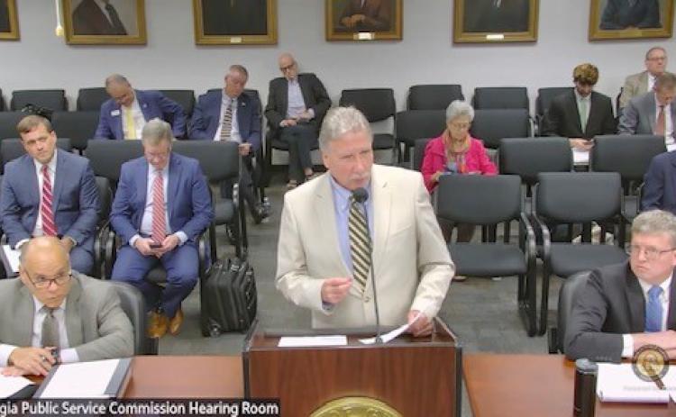 Submitted. Rabun County Commission Chairman Greg James talks before the panel at the PSC Hearing about storms.