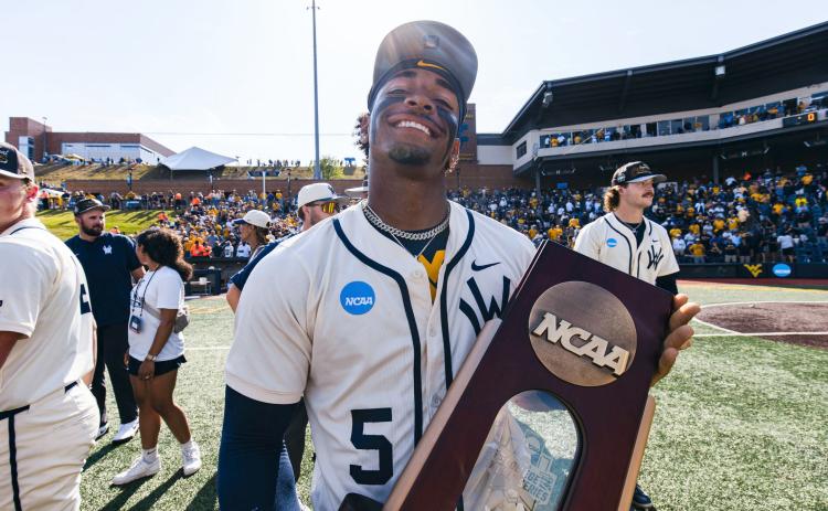 Photos courtesy WVU Athletics. Armani Guzman, a Rabun Gap graduate, and the West Virginia Mountaineers earned their first trip to Omaha with a 45-15 overall record and No. 16 national seed.