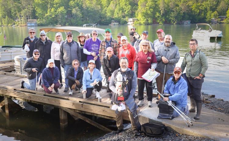 Submitted. Volunteers help clean up Lake Burton during the May 8 annual Cleanup Day. Those volunteers are individuals from LBCA, Georgia Power, Rotary Impact Club of Clayton and Savannah Riverkeeper.