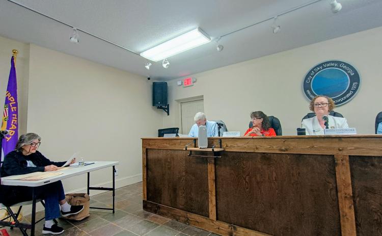 Megan Horn/The Clayton Tribune.  Sky Valley citizen Jerri Smith addresses council members during a May 26 city council Board of Zoning Appeals Hearing. Smith filed an appeal for an administrative interpretation with the city’s Board of Zoning Appeals following a March 5 decision by the council to adopt an amendment to the Sky Valley Zoning Ordinance that adds language allowing full-time and part-time residents to be appointed to serve on the Sky Valley Planning and Zoning Commission.