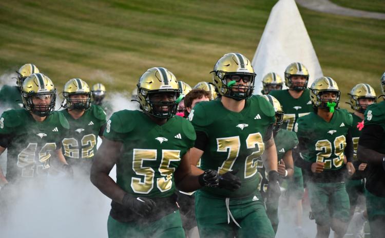 Wesley Branch/The Clayton Tribune. Rabun Gap players run onto the field ahead of kickoff before the Eagles’ game with Christian Brothers College on Oct. 3, 2025. Rabun Gap will face CBC once again this season, as well as four other nationally ranked teams. The Eagles are the preseason No. 115 team in the nation.