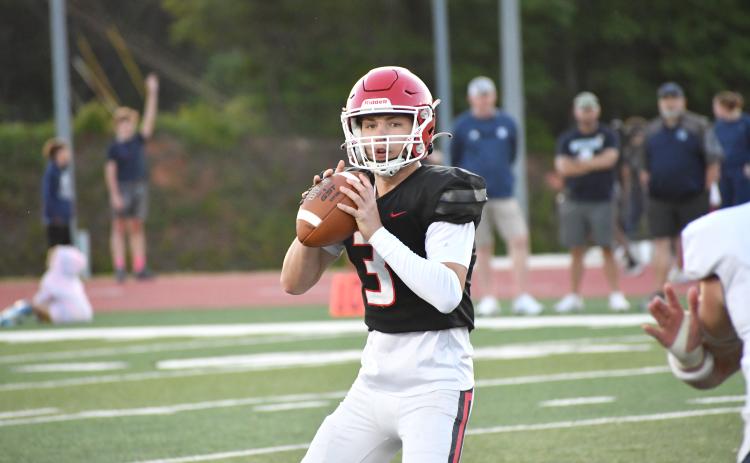 Wesley Branch/The Clayton Tribune. Rabun County sophomore quarterback Cooper Kowalsky looks downfield for an open receiver in the Wildcats’ spring game versus White County on May 15. Kowalsky will be Rabun County’s starting quarterback this season.