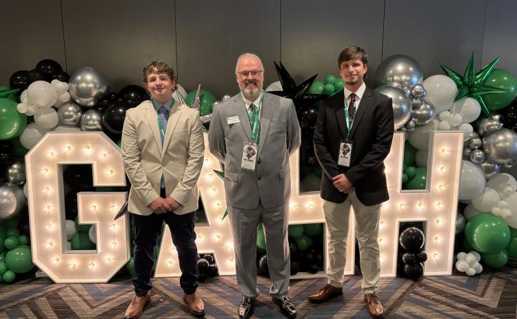 Photo courtesy of Rabun County 4-H. Rabun County 4-H members Wesley McCrackin, left, and Peyton Hicks, right, represented their county at the 83rd Annual Georgia 4-H State Congress, held in Atlanta, on July 21-24. Pictured center is Rabun County 4-H Educator Joey Eller.