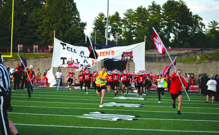 Enoch Autry/The Clayton Tribune. The Rabun County Wildcats run out onto the field to begin their 2026 campaign. RCHS would defeat visiting Metter 27-23 as former coach Lee Shaw brought his Tigers to Tiger.