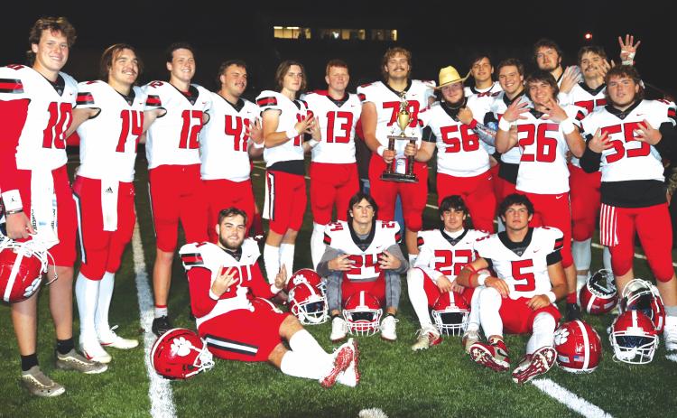 Photo courtesy of Von Watts. Rabun County retained the Region 8-AA championship on Oct. 28, 2021, scoring eight first-half touchdowns while dominating Union County in Blairsville. Gunner Stockton is pictured on the left with his teammates during his senior year at RCHS. Stockton’s UGA season will begin on Saturday, Sept. 4.