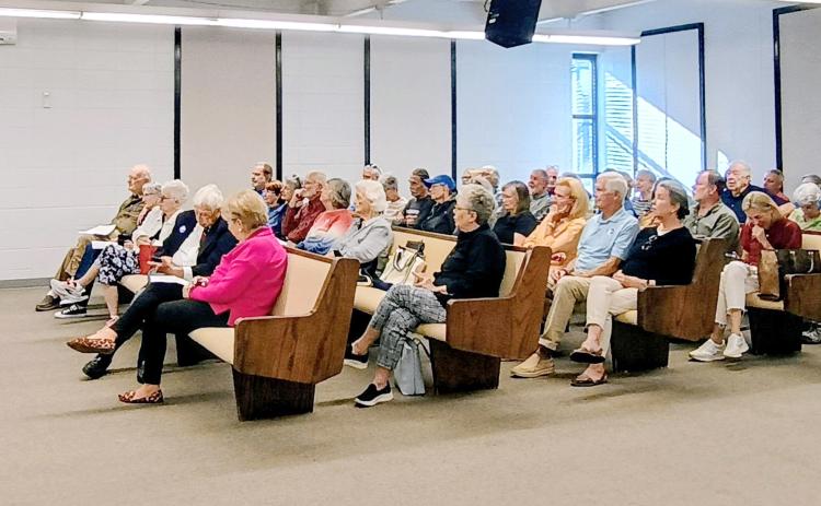 Megan Horn/The Clayton Tribune. The Tuesday, Oct. 13 City of Clayton work session and public hearing were well-attended by citizens awaiting the council’s decision on the millage rate. Citizens erupted in applause at the news that the council planned to adopt the current rate of 7.059 and not raise the millage rate. Pictured, left, is citizen Dee Daley, who is also a representative of the Rabun County Coalition for Good Government.