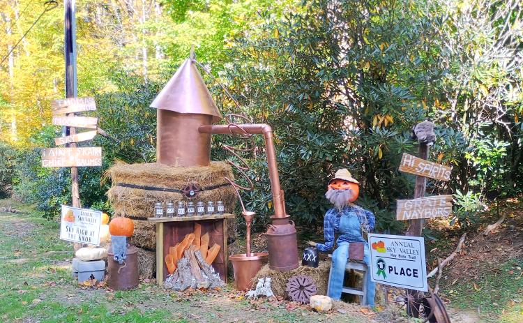 Megan Horn/The Clayton Tribune. The first place winner of the Sky Valley Hay Bale Trail was “Sky High at The Knob” for this hay bale that was decorated as a moonshine still.  The Sky Valley Fall Festival day was filled with plenty of fun.