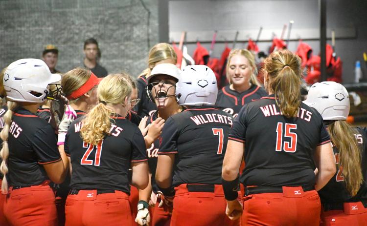 Wesley Branch/The Clayton Tribune. RCHS celebrates after a three-run home run by junior River Evans, center, of the Lady Cats’ win over Clarke Central on Oct. 5. Rabun County’s season came to an end in the first round of the playoffs.