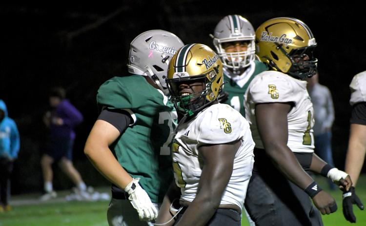 Wesley Branch/The Clayton Tribune. Rabun Gap defensive lineman Royce Djouguem celebrates after a tackle in the Eagles’ 28-6 win versus Christ School on Oct. 16. Djouguem had four total tackles and a sack in the win.