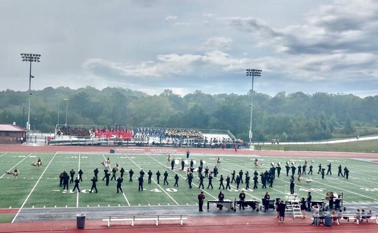 Submitted photo. The Rabun County High School marching band also had to manage the rain that came down during its Oct. 3 performance at the Jaguar Classic in Douglasville, Ga.