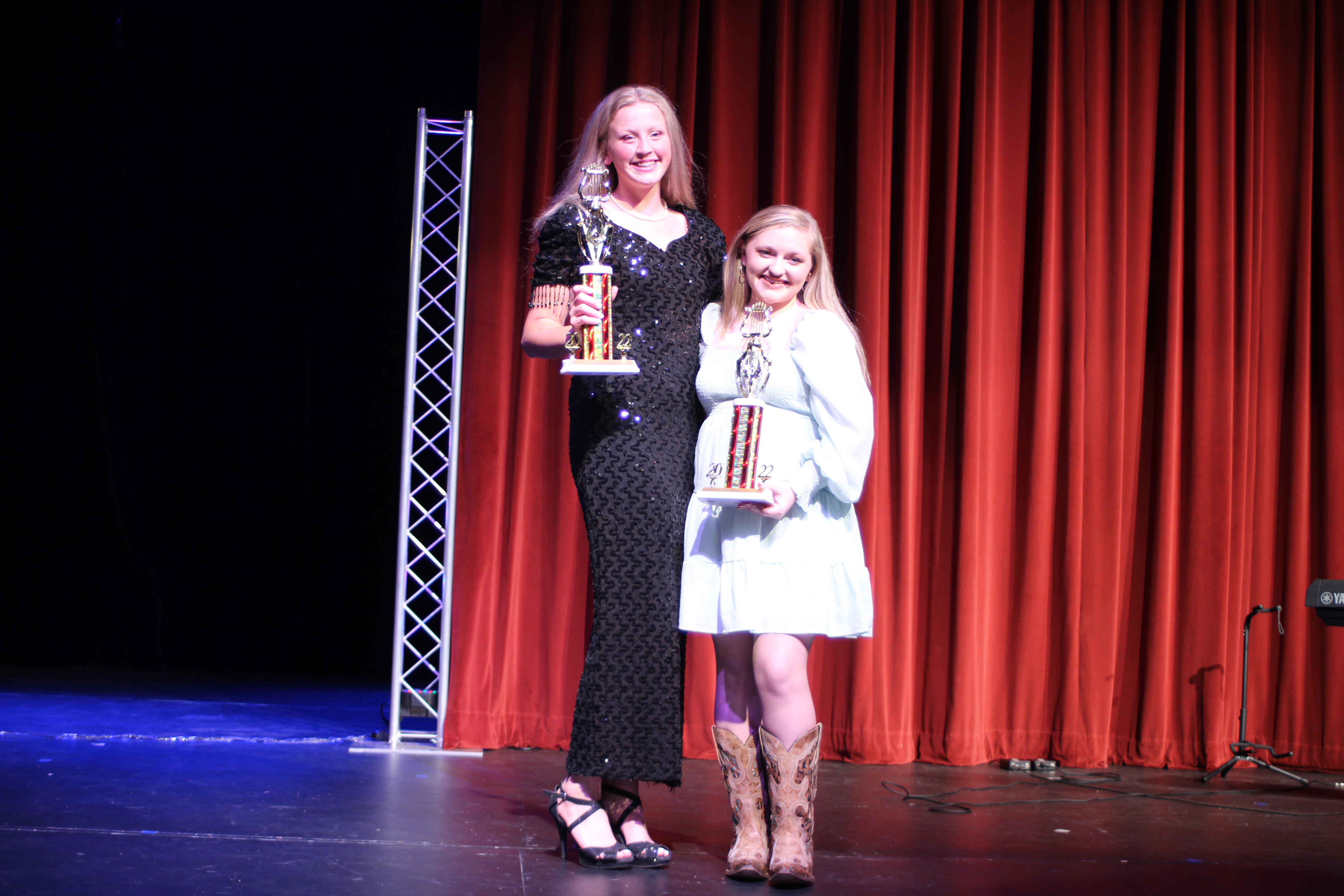 Megan Broome/The Clayton Tribune. Hailey Smith, left, took home the award for Judges’ Choice and Ashlynn Blackwell took home the award for Fan Favorite at the Rabun Idol competition held at the Rabun County High School Fine Arts Building March 19. Smith sang “Burning House” by Cam and “Con el Viento” by Jesse Reyes. Blackwell sang “Dirt Road Prayer” by Lauren Alaina and “Shut Up and Fish” by Maddie and Tae. Judges were Allen Blair, Alicia Kilby and Daven Vandenberg. 