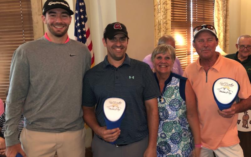 Sid Weber Memorial Cancer Fund golf tournament first flight winners are, from left, Taylor Spears, Patrick Heher, Vickie Heher and Kelly Moore. (Photo by Jennifer Arbitter/Special to The Tribune)
